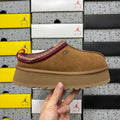UGG Tazz Platform Slipper – Suede Mule with Shearling Lining, Red & Gold Braided Collar Trim, Red Pull Tab & Chunky Platform Sole in Chestnut