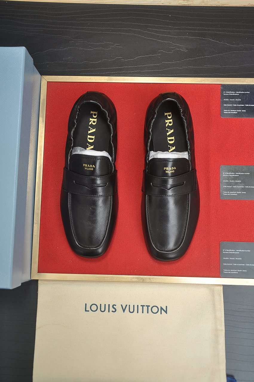 Prada Strap-Detail Slip-On Loafers